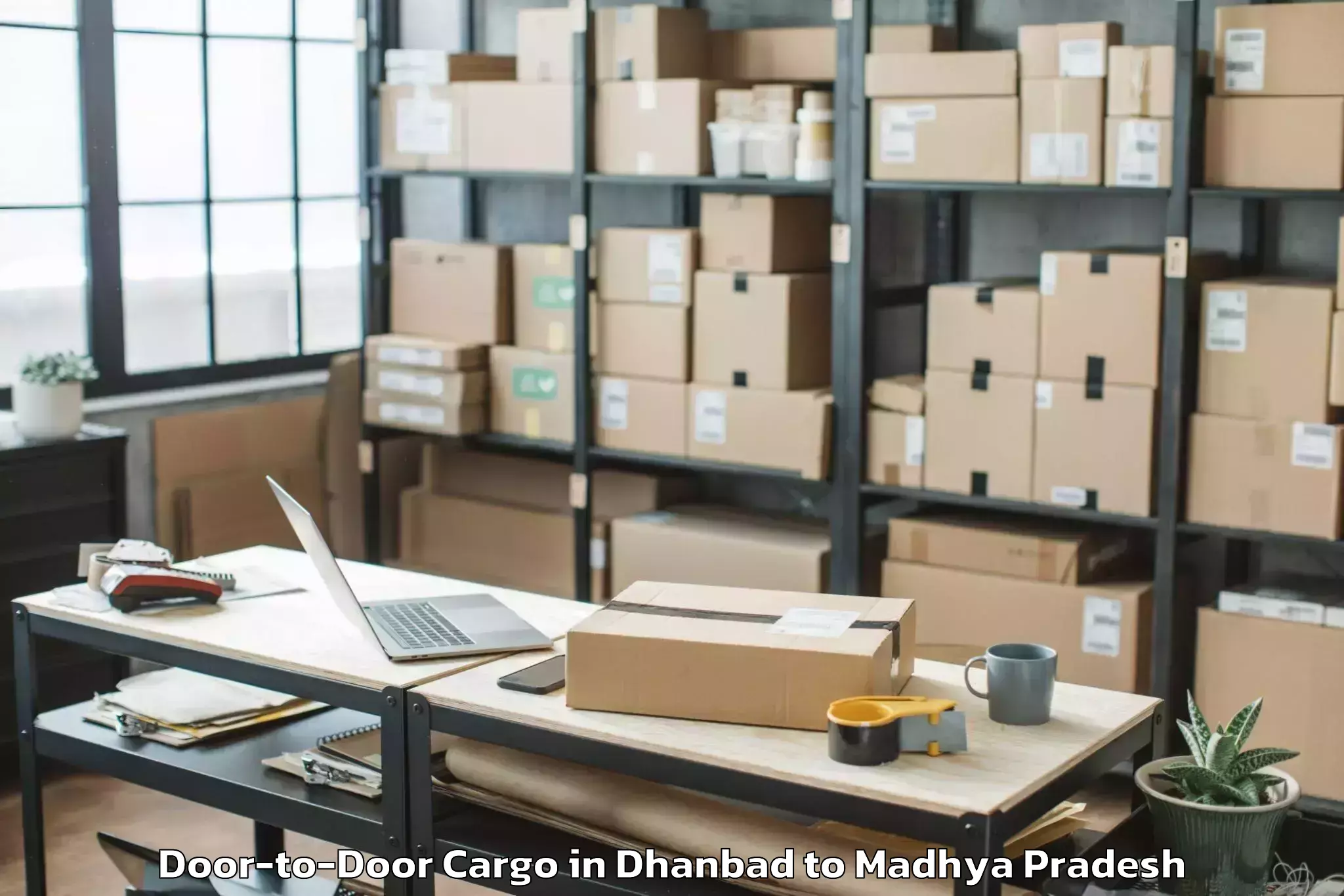 Book Dhanbad to Mandsaur University Mandsaur Door To Door Cargo